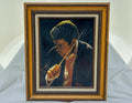 Framed painting of a person holding a stick