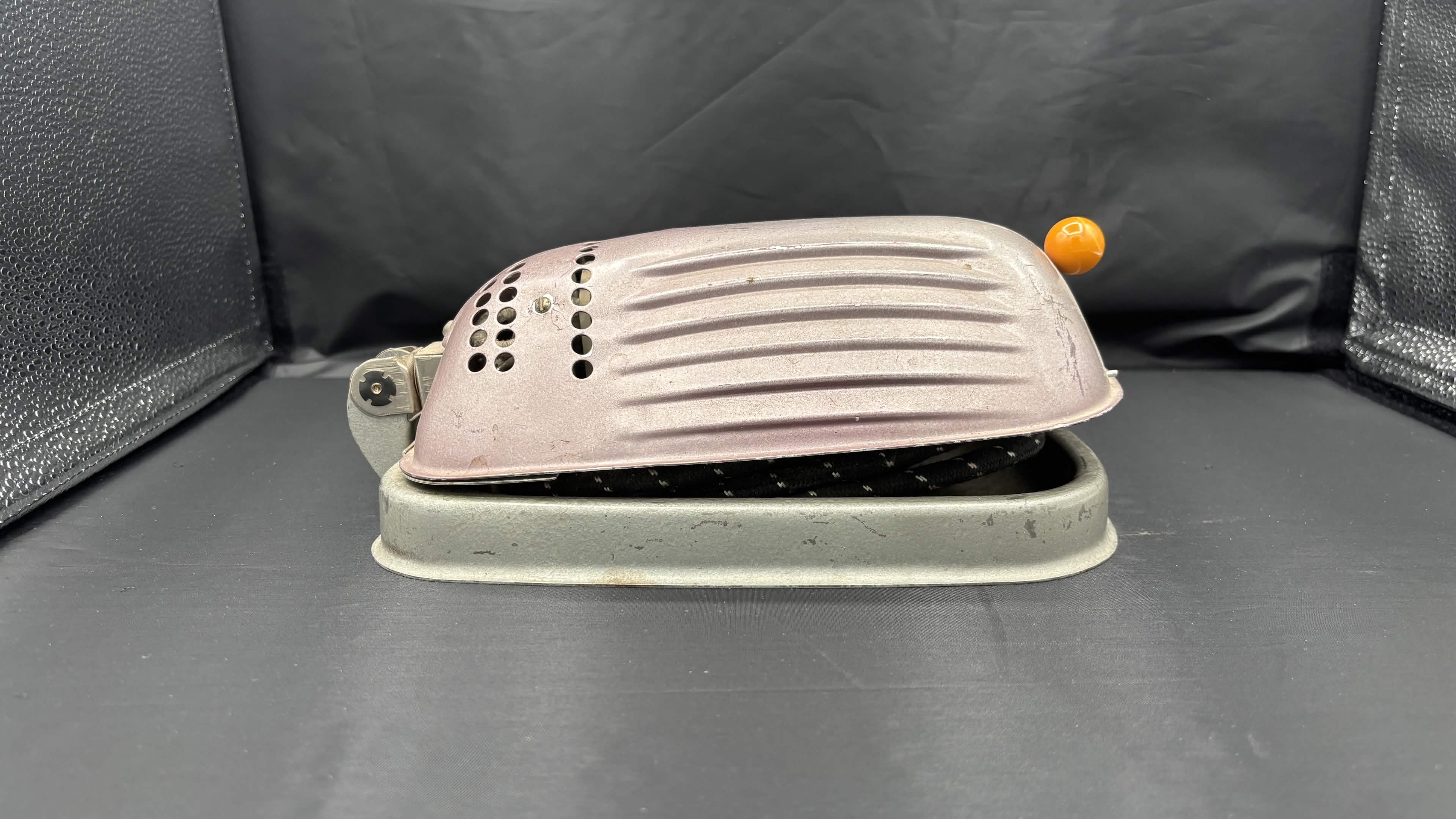 Vintage Metal Device with Orange Knob