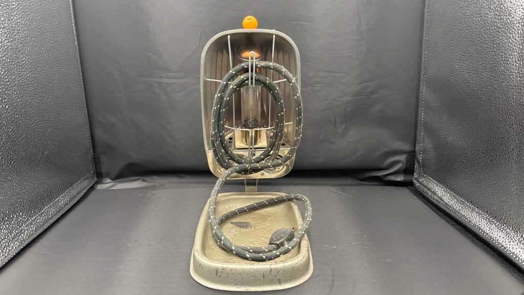 Vintage Metal Device with Orange Knob